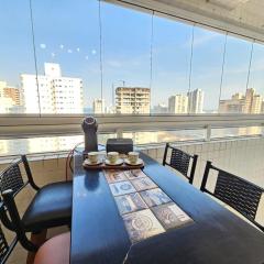 Vista Praia Mar - 2 dormts - com AR condicionado na Suíte - Sala de Estar e Jantar com cozinha integrada - 250 m da praia da Aviação - WI FI - Varanda Gourmet com Churrasqueira e ESTACIONAMENTO gratuito