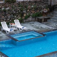 Lake and Hill Pet-friendly 3-BHK Retreat With Private Pool, Bar, Garden, Gazebo & Majestic Aravali Views