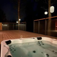 Log cabin with hot tub and views