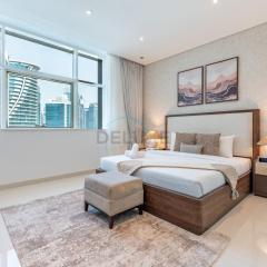 Walking Distance to Bay Avenue Mall, 5 Minutes Drive to Downtown Dubai, Close to Metro Station, With Canal View, The Cosmopolitan, Business Bay by Deluxe Holiday Homes