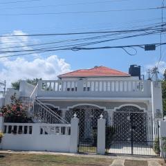 2 Bedroom upstairs large flat in Portmore Pines