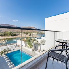Modern 3BR with Mountain Views and Private Pool in Al Dana Island, Fujairah by Deluxe Holiday Homes