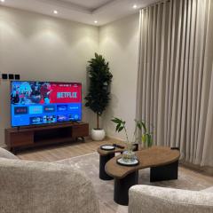 شقة دور ارضي غرفة وصالة أنيقة دخول ذكي