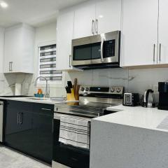 Cozy 2 bedroom suite Pet Friendly Heated Garage