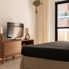 Apartamento completo com garagem a 150 m da praia