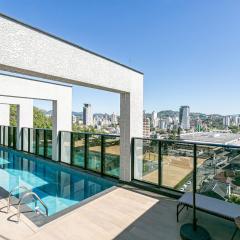Village Lofts a 5 minutos da Vila Germânica com piscina aquecida no terraço