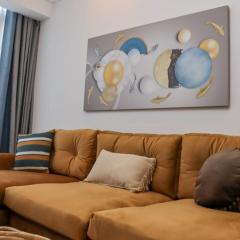 modern serenity suites apartments with swimming pool,modern equipped gym,private parking space, children playing ground, proximity to major shopping malls and unbeatable city views