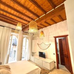Kalma Via Manno - Central Stay with Stone Walls & Private Cinema