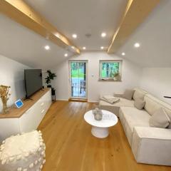 Alpenloft mit Garten & BBQ am Chiemsee by Dollop Living