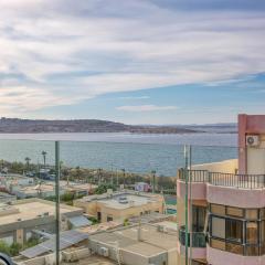 A 2BR designer seafront home with Wifi, AC and Beach by 360 Estates