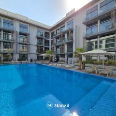 Modern 2BR Apartment in JVC with Pool and Gym near Circle Mall
