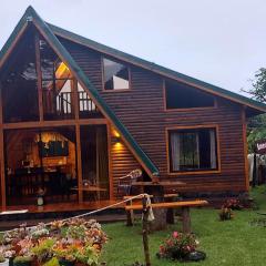 Magic Cabin in Jardín de Dota A real Costa Rican Farm experience with Breakfast included Trout fishing in the lagoon Fruit tasting & beautiful garden with farm animals