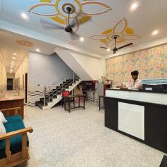 Regard by "Rudra prabha Inn" front of Ram Mandir vip gate number 11& 200 metre Ayodhya dham station