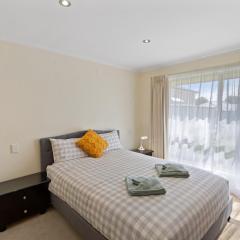 Comfortable 4-Bedroom Home with Backyard Escape