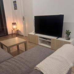 Séjour cosy avec vue mer, Clim et Netflix