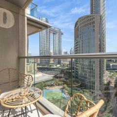 Vogue In the Heart of Downtown Walkable to Burj Khalifa & Dubai Mall Spacious Two Bedroom Apartment with Large Balcony and full Amenities