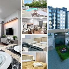 Apartamento Inteiro - 2 Quartos com AC - Wifi 1000mb - Piscina - 1 Vaga de Garagem - Elevador - Sacada Gourmet - Indicado para Grupos, Hospedes a Trabalho, Família e Pets