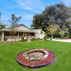 Serene home with enclosed yard, grill, games, & central AC - dog-friendly