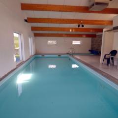 Quaint holiday home with heated indoor pool