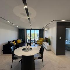 Beautiful apartment with air conditioning, balcony and underground garage