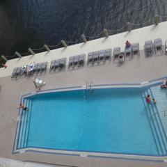 Beach Escape with Balcony & Resort Amenities