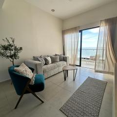 Relax with panoramic ocean and city views