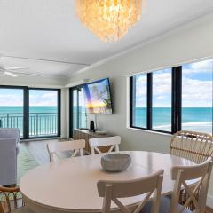 Updated direct oceanfront corner condo with large wrap-around balcony and heated pool