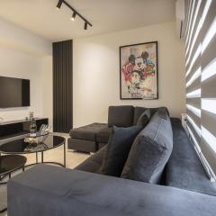 Black & White 2BR Apt steps from Mavili Square