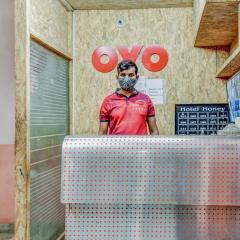 Capital O Honey Hotel