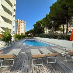 Apartment with pool near the beach