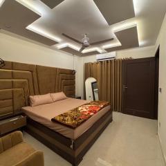 The DownTown Den 1BHK Deluxe Suite Bahria