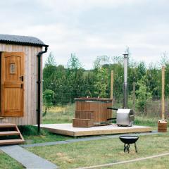 Shepherd's Huts in Barley Meadow at Spring Hill Farm