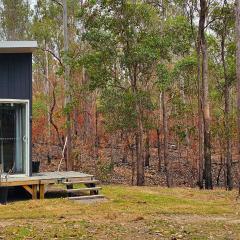 Hidden Camp's Loft House by Tiny Away