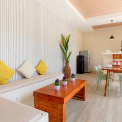 KIKI VILLAGE BATHTUB AND LIVING ROOM