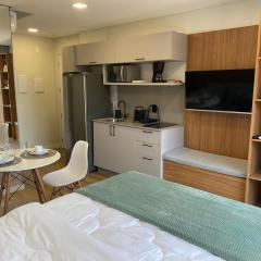 Loft moderno e completo próximo a Vila Germânica