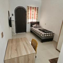 Cute Room 1 at Pondok Raima SYARIAH