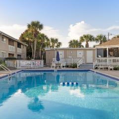Steps from the Sand Bright Coastal Stay w Pool Access Coastal Hideaway by AvantStay