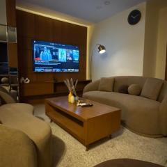 Skyluxe Designer Suites with rooftop Pool, Gym, Sauna & Self Check In