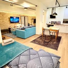 Skaists ķieģeļu studijas dzīvoklis Rīgas centrā