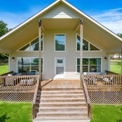 Lakefront home with huge yard and picturesque front porch