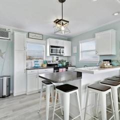 Coastal bungalow with huge yard, comfy deck and close to beach