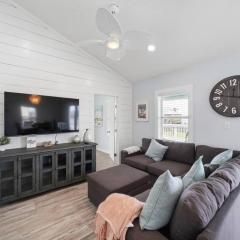 Beach bungalow with large, wrap-around deck, close to beach