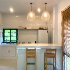 The Whispering Palm Coconut Lane