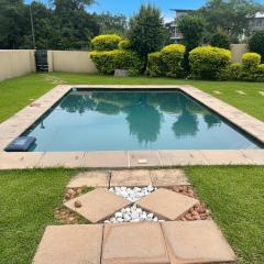 Stylish Riverside Home with Pool, Braai & Wi-Fi