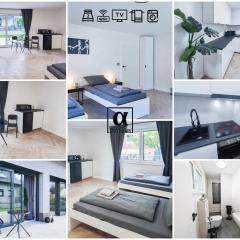 ALFA Stuttgart Doppelzimmer mit Teeküche und Terrasse Porsche Bosch l Gemeinschaftsbad WIFI SmartTV l Double room with kitchenette and terrace l shared bathroom BS21A5
