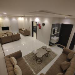Salam Apartments 2 Two bedrooms, a hall, two bathrooms, and a kitchen C