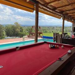 casa con vista 360 a las montañas y pileta