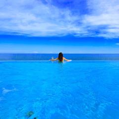White Coral Apartment Seafront Villa with Infinity Pool