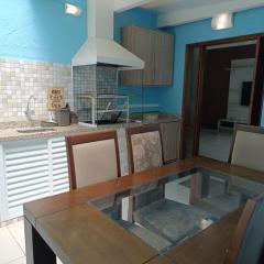 Casa aconchegante no Centro de Peruíbe, faça tudo a pé