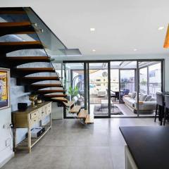 Eclectic Duplex with Large Balcony by HolyGuest